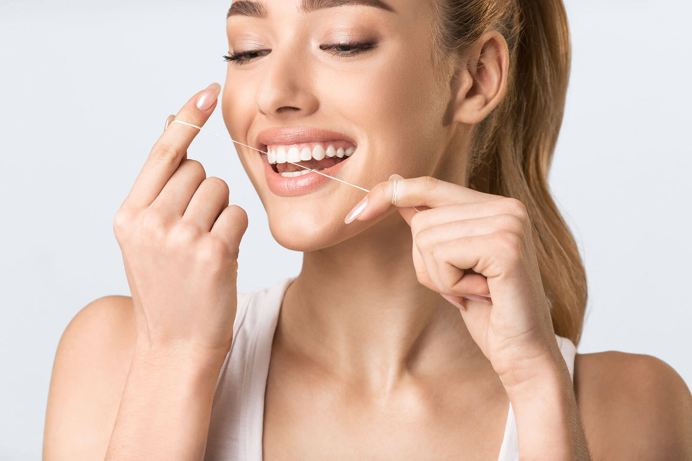 Martina Dental - Preventative dental care - flossing