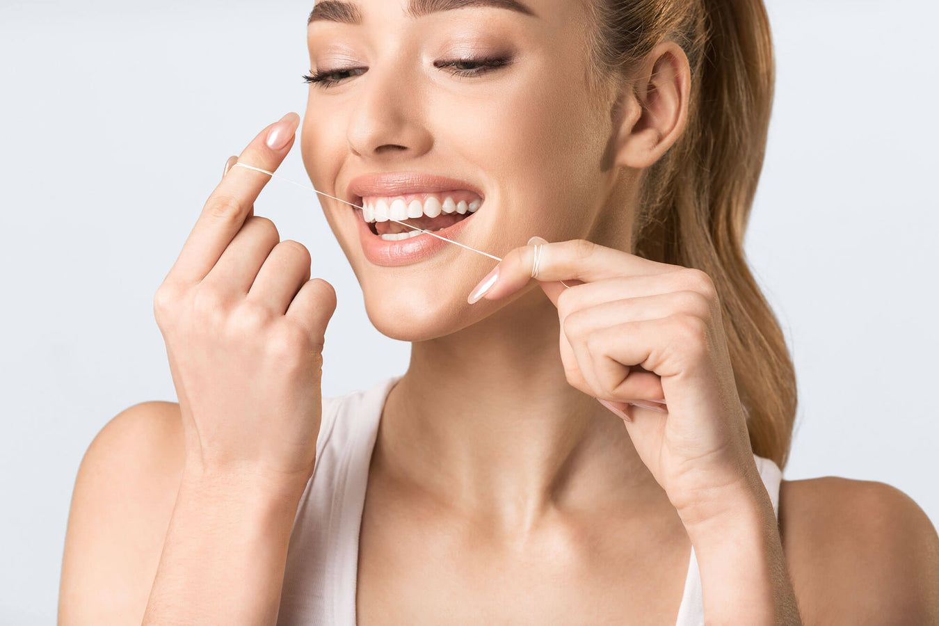 Martina Dental - Preventative dental care - flossing 